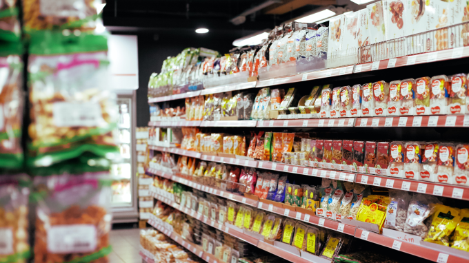 Products on shelves in a corner shop